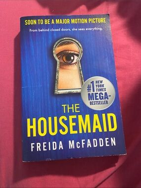 The Housemaid by Freida McFadden - Blue & Yellow Paperback